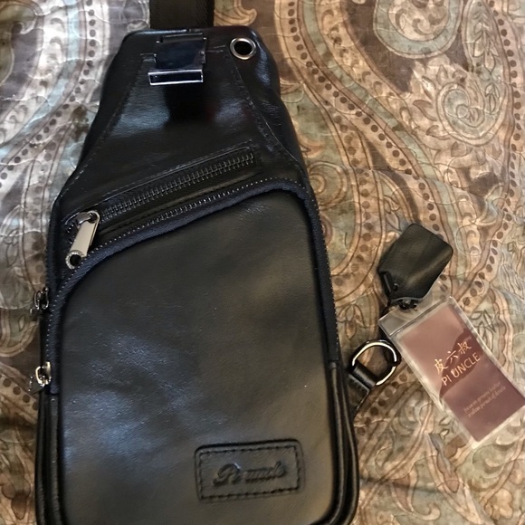 Black PI uncle unisex convertible leather carrier NWT - Picture 1 of 6